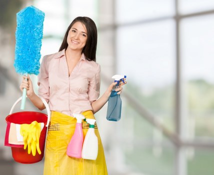 Cleaner working on stairs and hallway carpets in Hampstead