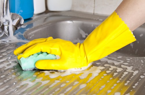 Local technician cleaning a fabric sofa in Hampstead